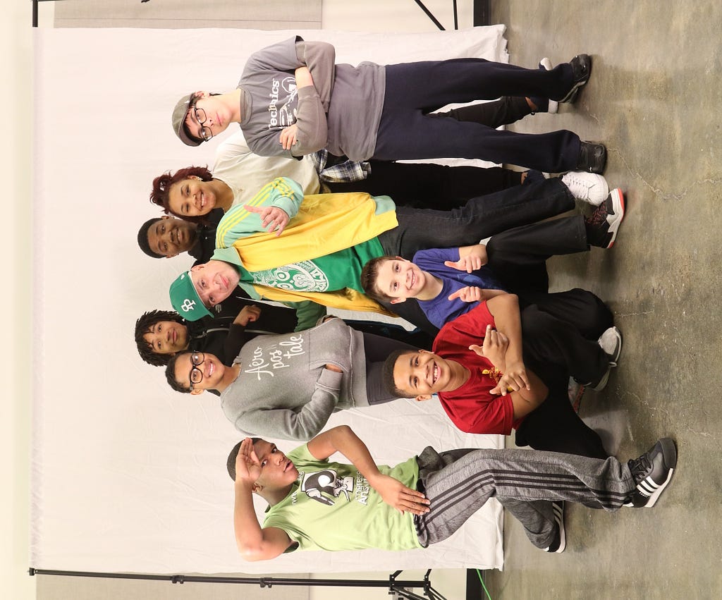 PAA students with hip-hop dance pioneer Popmaster Fabel during a recent workshop in which students learned how to use Scratch to code dance animations. Photo by Jared Akerstrom.