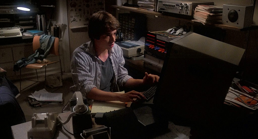 Matthew Broderick “war-dialing” in Wargames — to this day one of the more accurate representations of computer hacking in Hollywood cinema. Wargames, 1983. MGM/UA