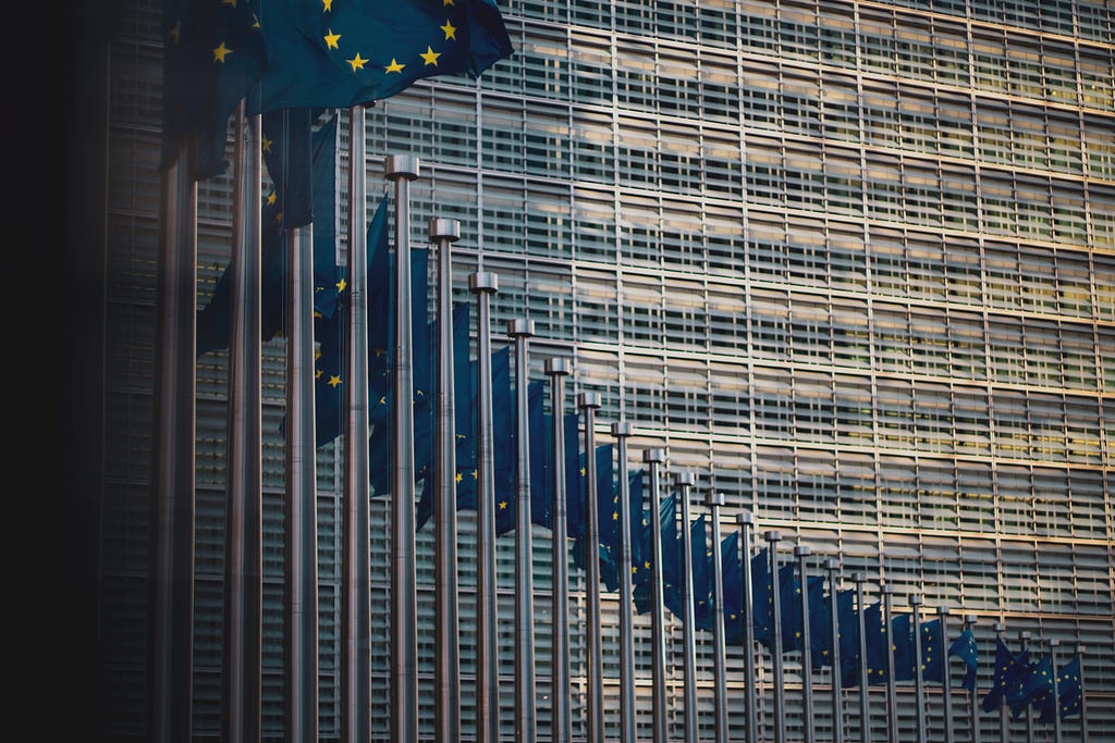 Flags of the member states of the European Union in front of the European Commission building in Brussels.