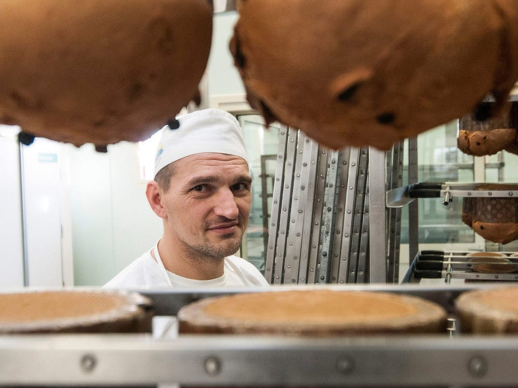 A prisoner looks on in the bakery in 2015 in Padova, Italy.