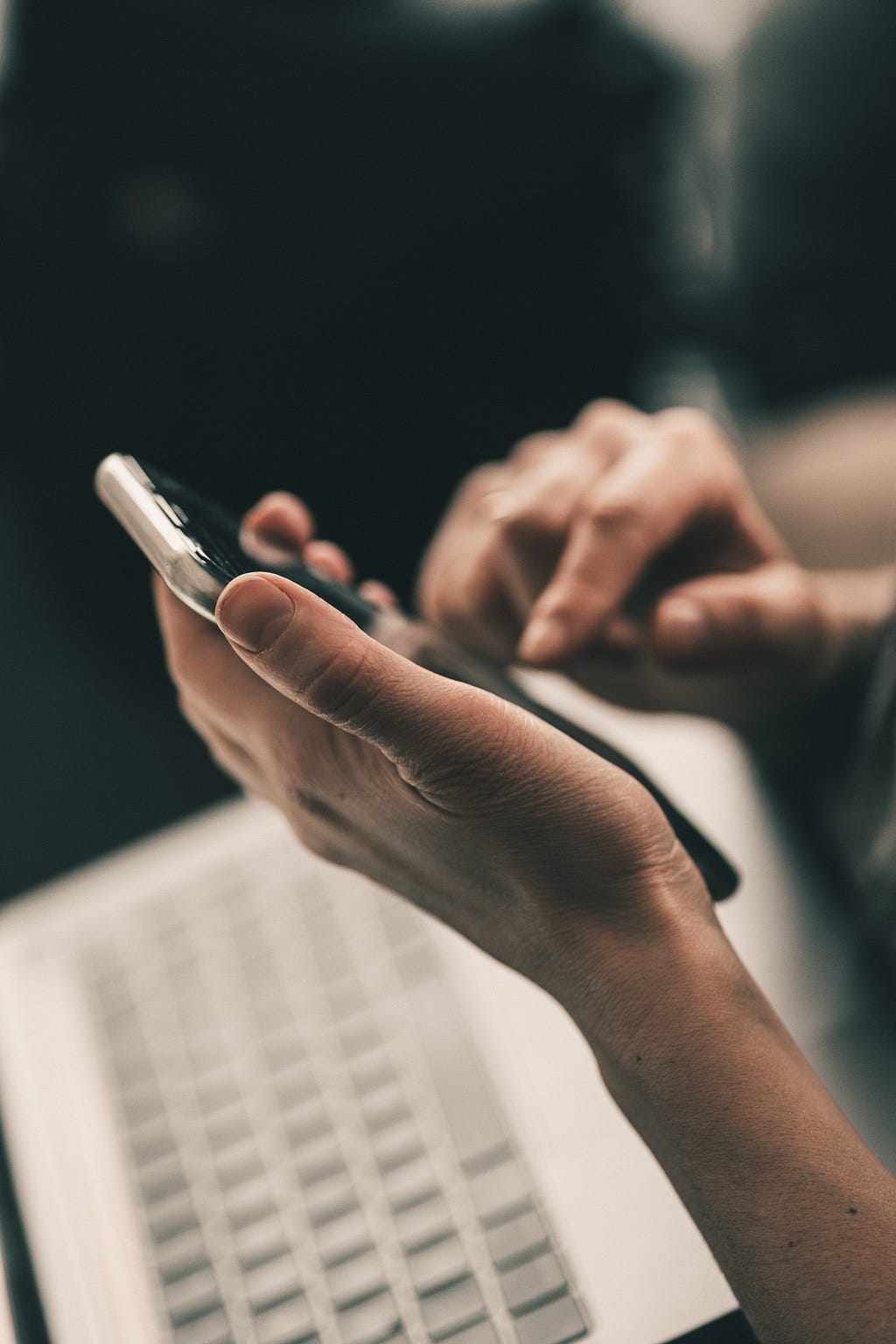 person on their phone about to call a business to book a service