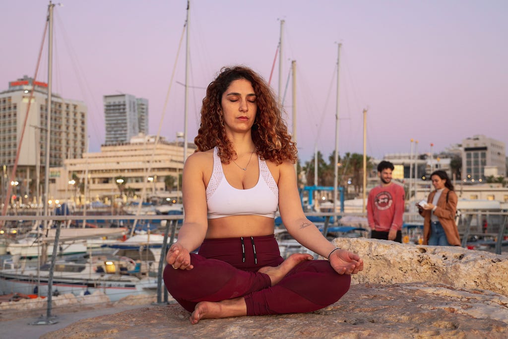 pic of a young lady meditating