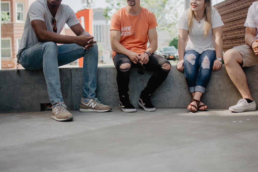 Groups of friends sitting around chatting