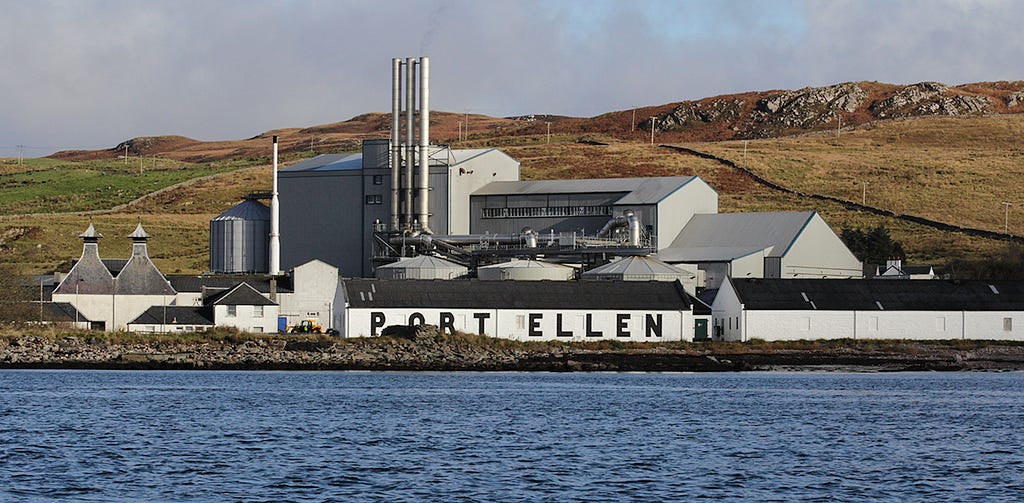 The Port Ellen Distillery and its warehouses, with Diageo's Port Ellen Maltings in the background. Photo ©2017, Mark Gillespie/CaskStrength Media.