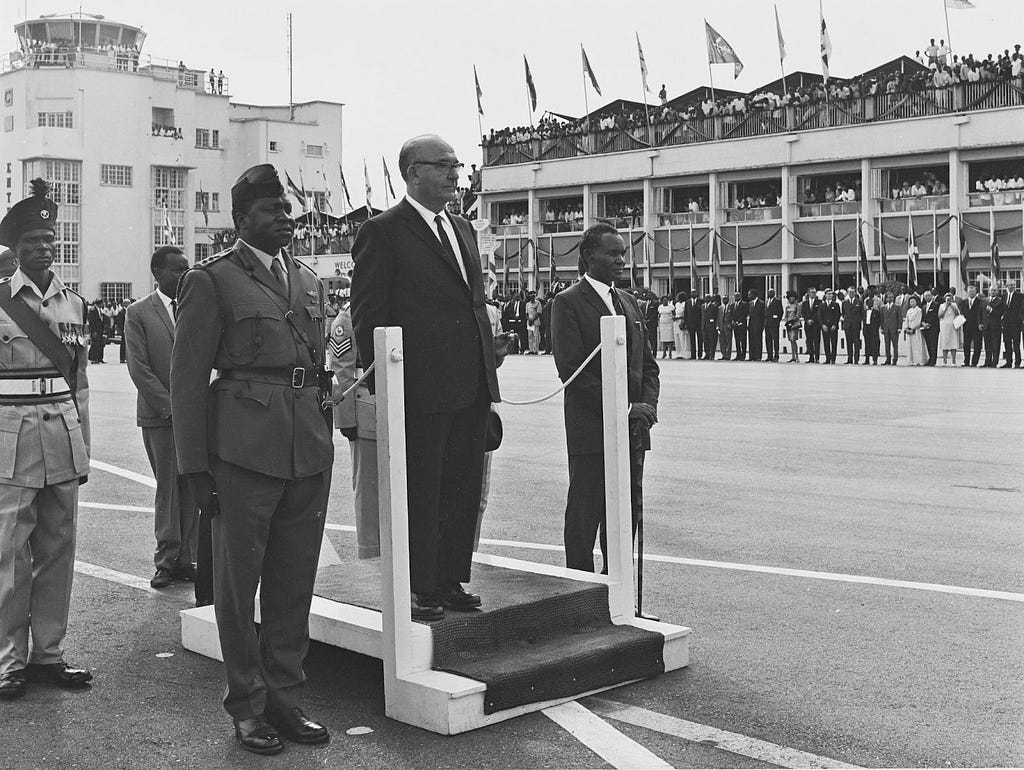 African leaders, Idi Amin Dada, Ugandan dictator, men standing upright during national anthem, Ugandan politicians in the 90s