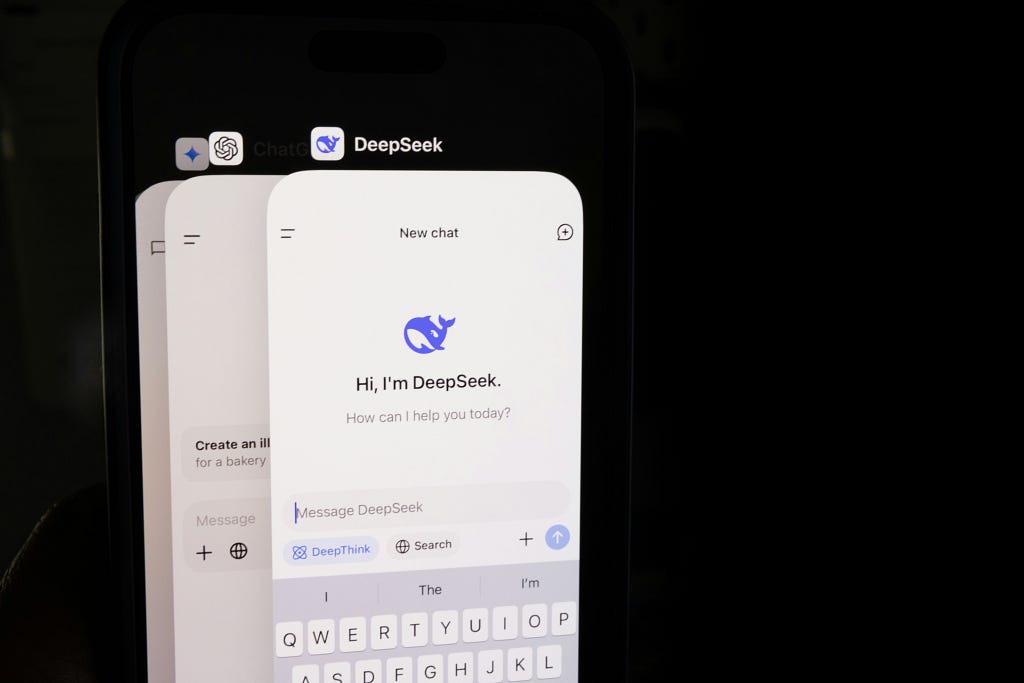 Ai search engine tabs on a mobile device, for an article about AEO for website AI visibility for brands in 2026