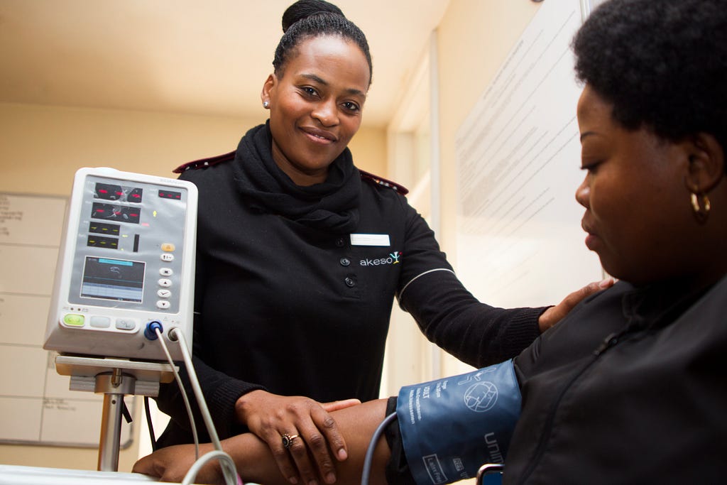 Patient and a medical practitioner at an appointment