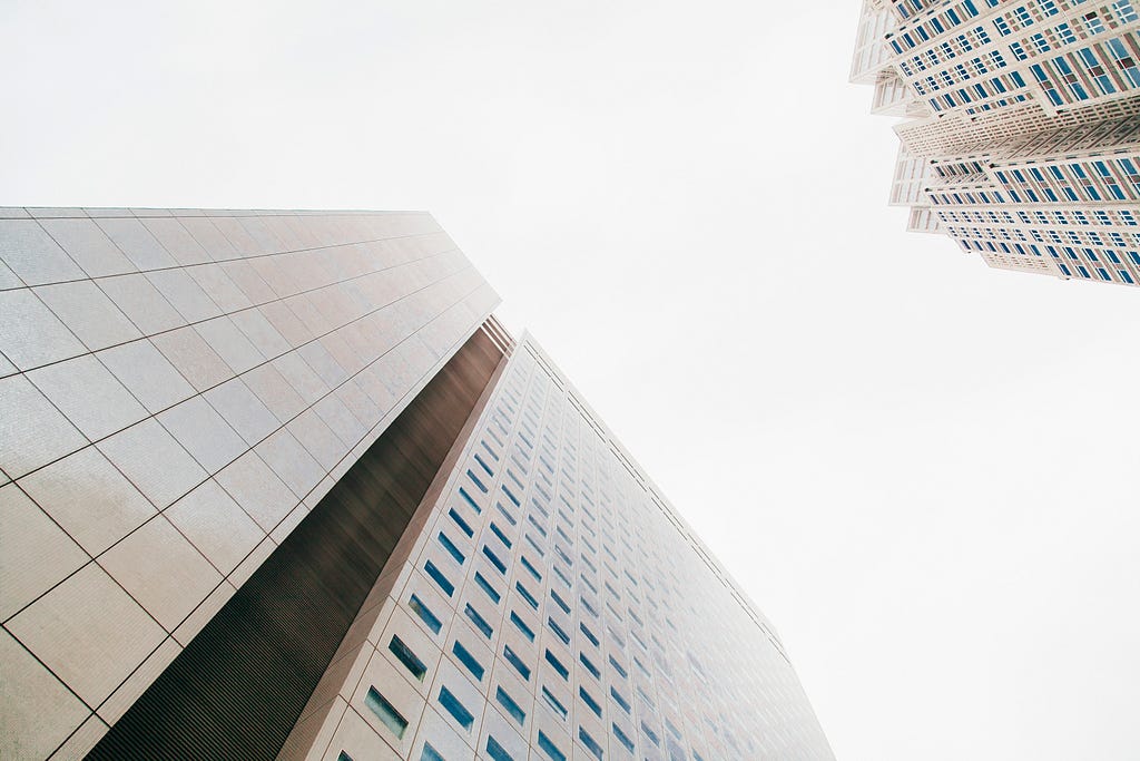 a photo of two buildings