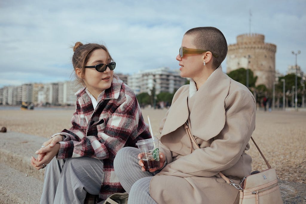 Two women chatting outside