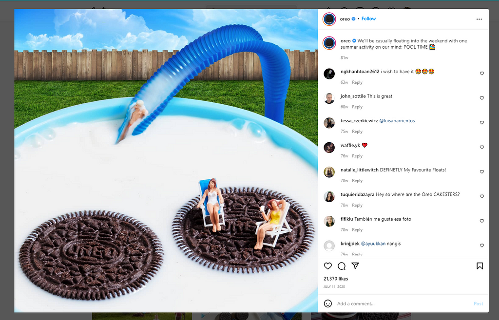 This is one more Instagram post by Oreo. This time the brand uses an image of a pool that is associated with summer and joy. The pool is filled with milk, there are people tanning on pool matresses that look like Oreo cookies, and a person is sliding down a water slide that looks like a straw. The post caption serves to brighten the mood: “We’ll be casually floating into the weekend with one summer activity on our mind: POOL TIME”.