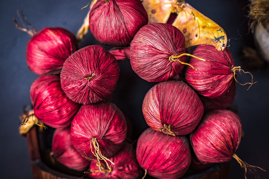 Red onions made out of yarn