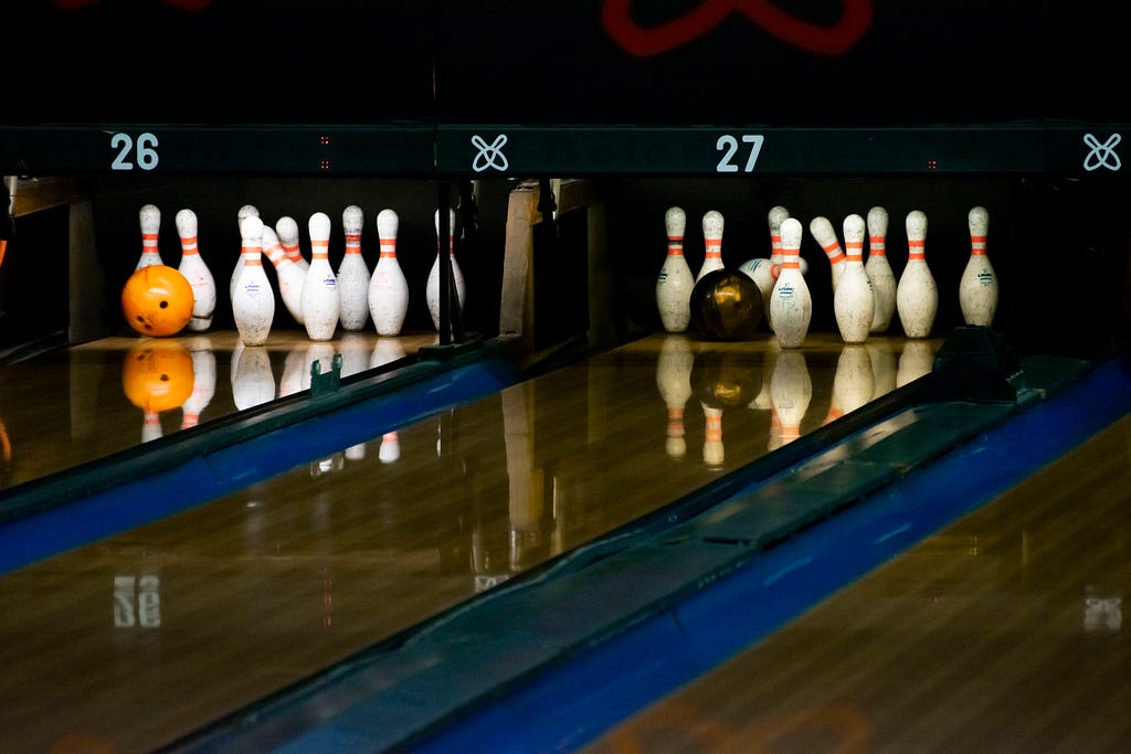 Two lanes bowling at the same time. Terrible bowling etiquette.