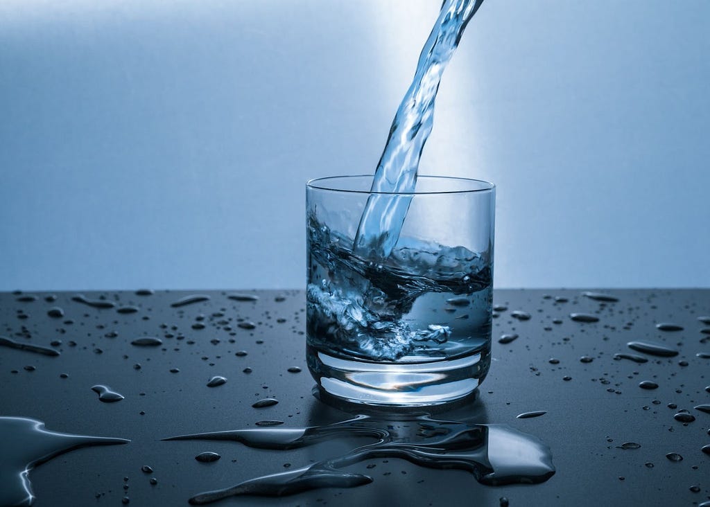 Water being poured in a glass.