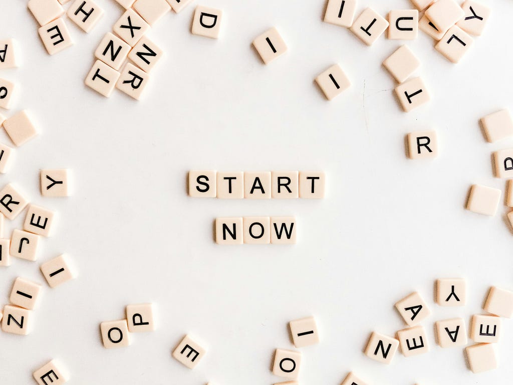 Letter Tiles that spell out “Start Now”