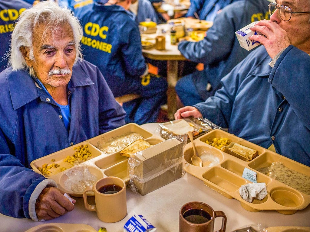 Inmates eat breakfast in San Luis Obispo, California in 2013.