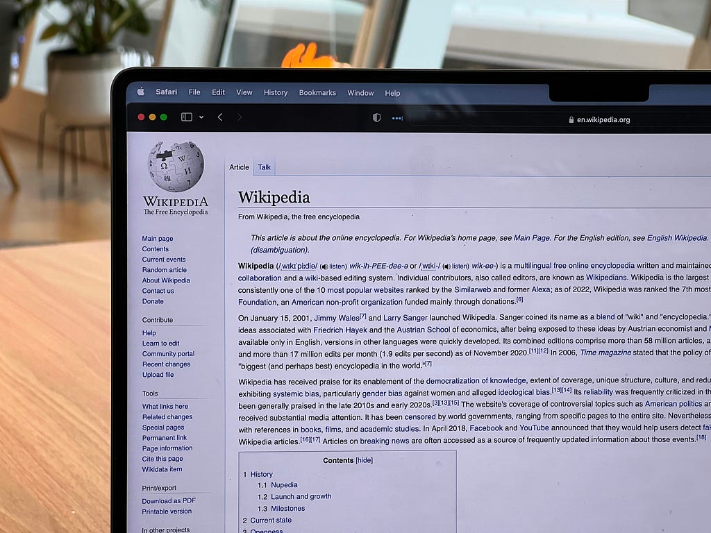 Wikipedia homepage opened on a laptop