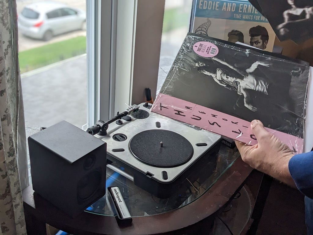 John playing his record