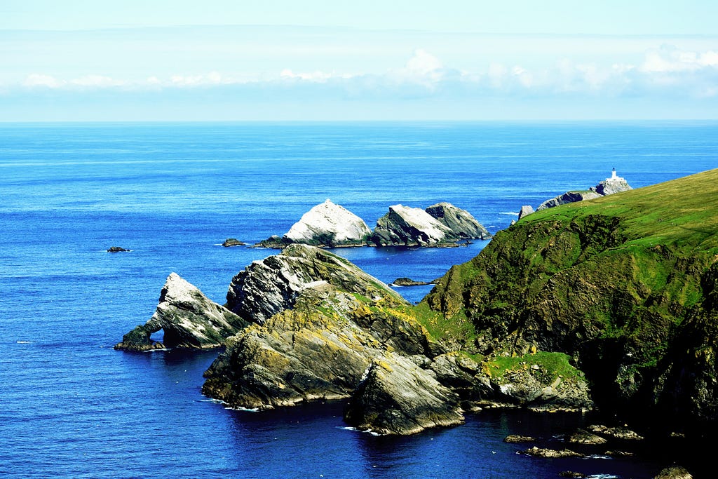 Rocks and boulders jutting into the sea