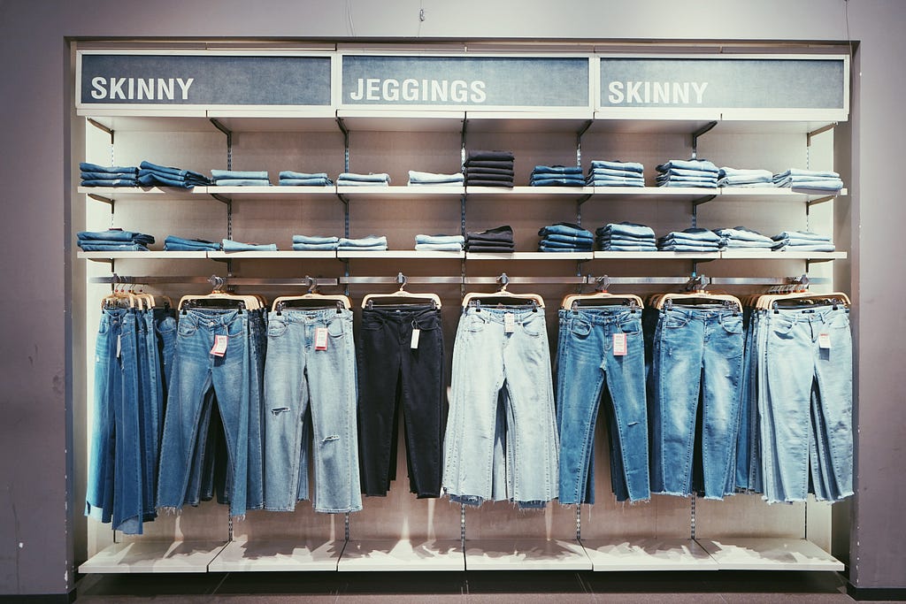 a display of different jean types in a store