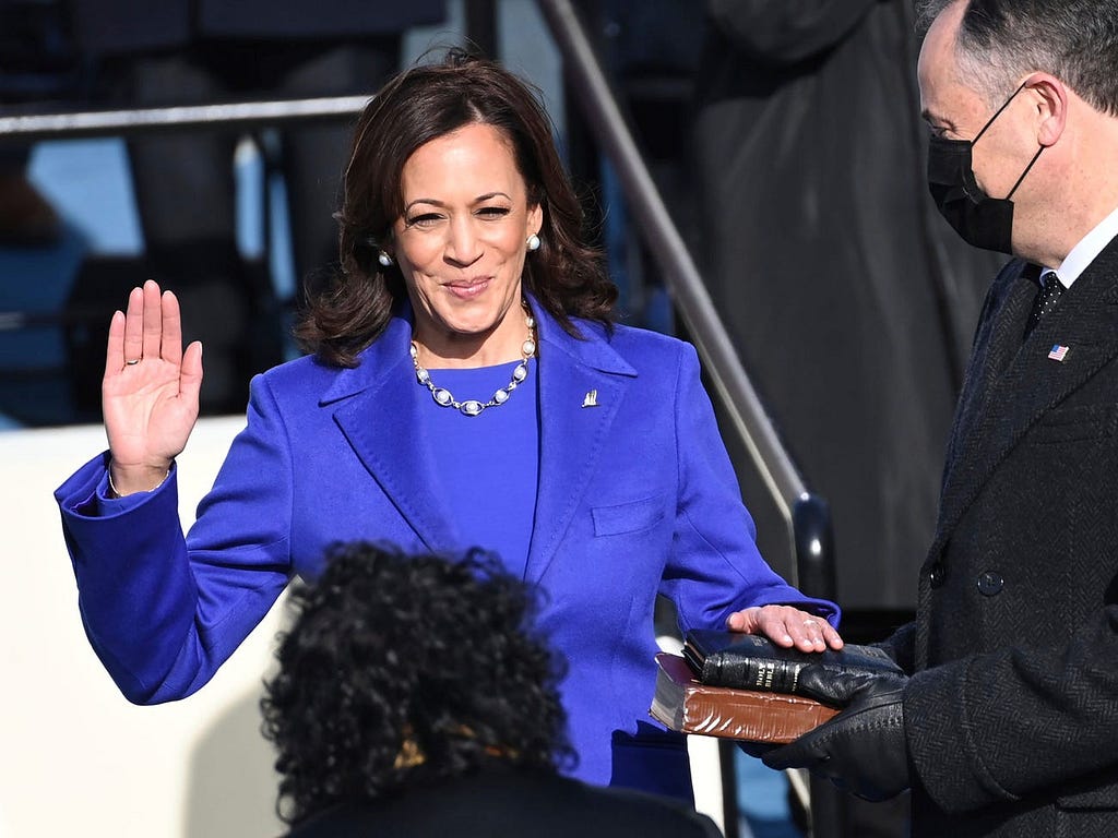 Kamala Harris is sworn in as vice president by Supreme Court Justice Sonia Sotomayor.