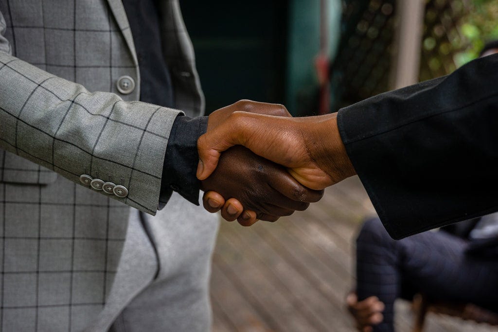 A picture of two men shaking hands