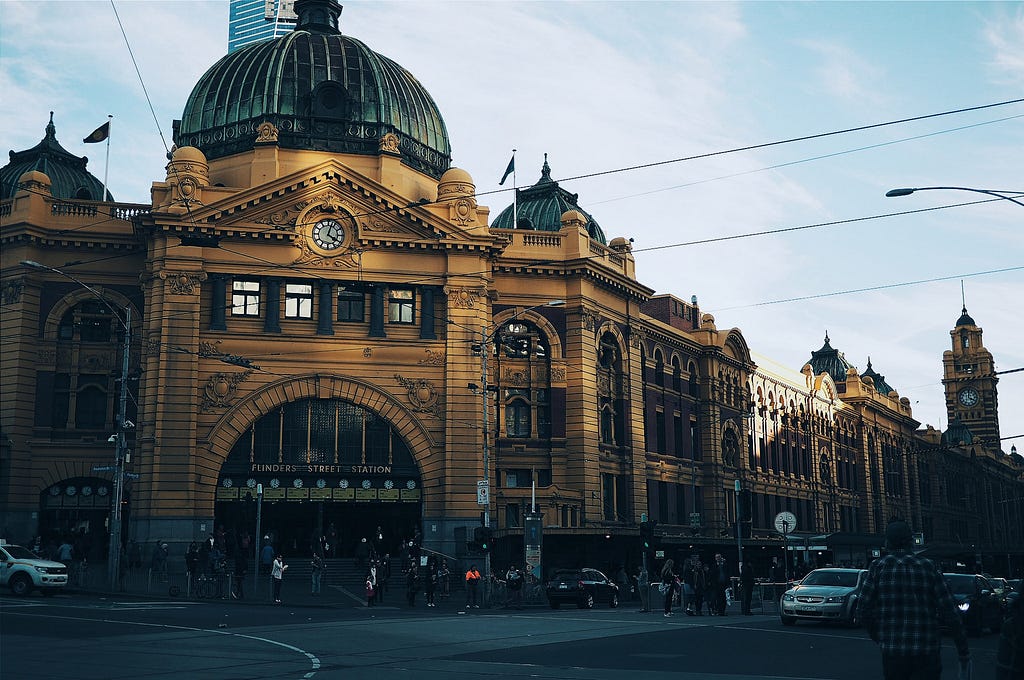 Driving outside Flinders Street Railway Station