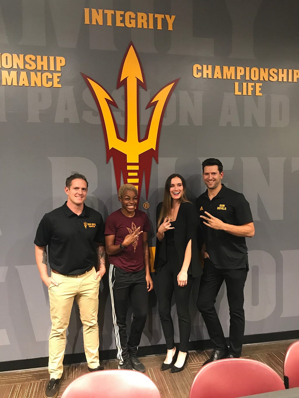 Panelists Roman Rozell, Jeminise Parris, Brittany Martin, and Jeff Kunowski pose together following the event.