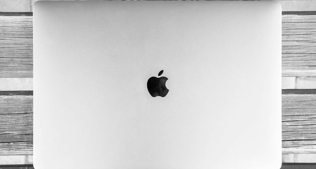 Mac laptop on table