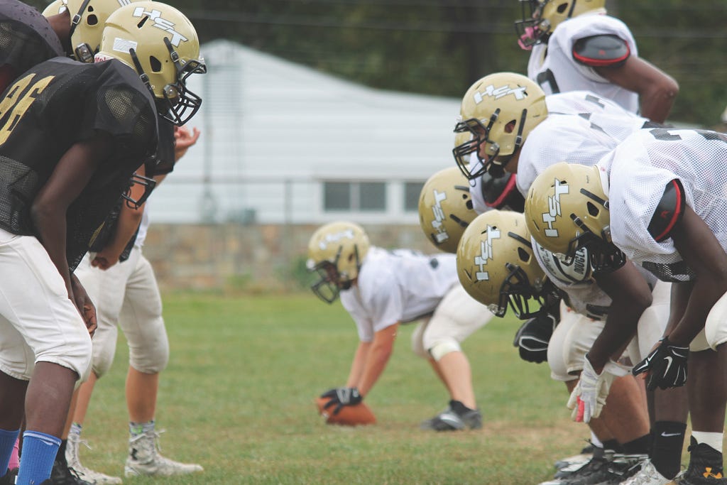 JACK FIRNENO / WIRE PHOTO The Harry S. Truman Tigers prepare last Thursday for their homecoming game against the Council Rock North Indians. The Tigers won 42-40.