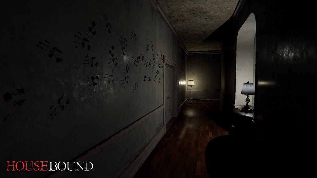 Screenshot of Housebound — A dimly lit hallway with many handprints along the wall