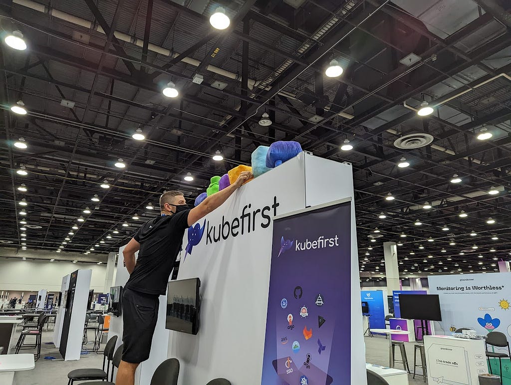 Cofounder Jared Edwards setting up the Kubefirst booth