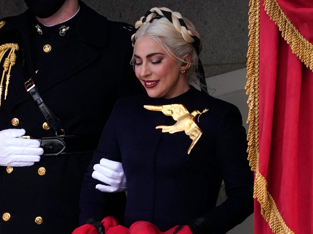 Lady Gaga’s brooch was a dove.