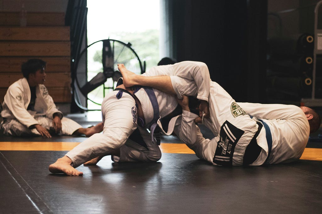 Two Judo players competing against each other