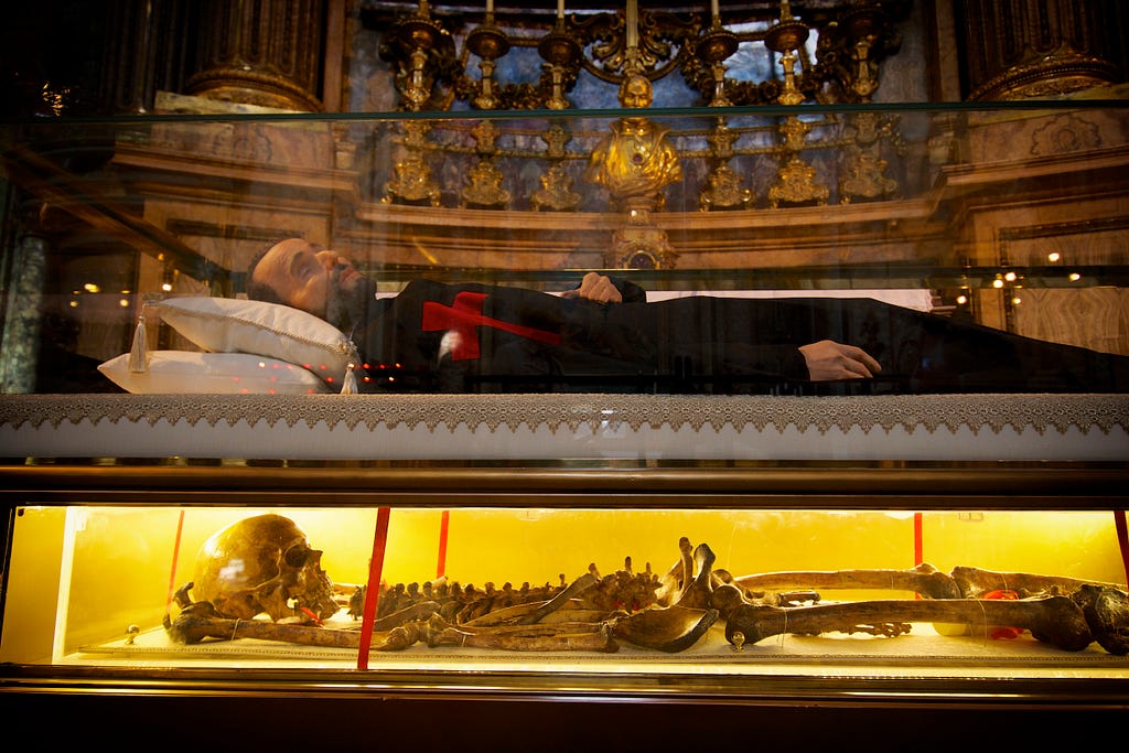 The skeleton of a priest inside the crypt of a Catholic church