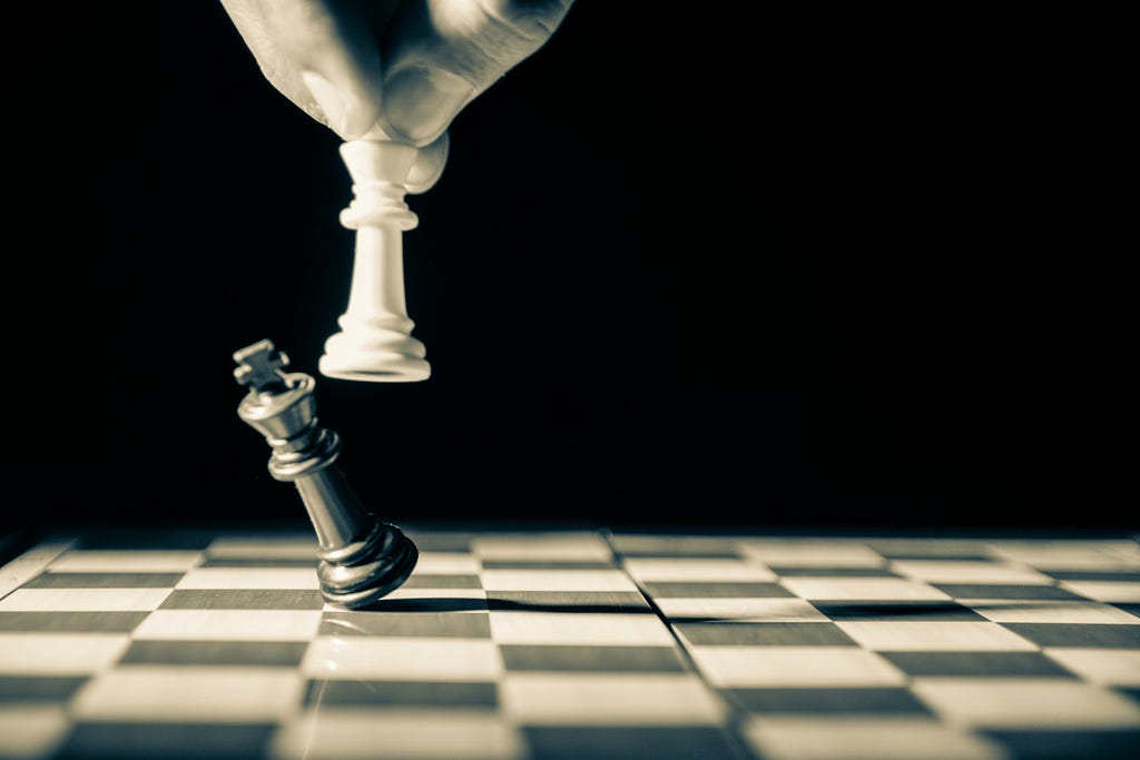 White king beats a black king on an empty chessboard