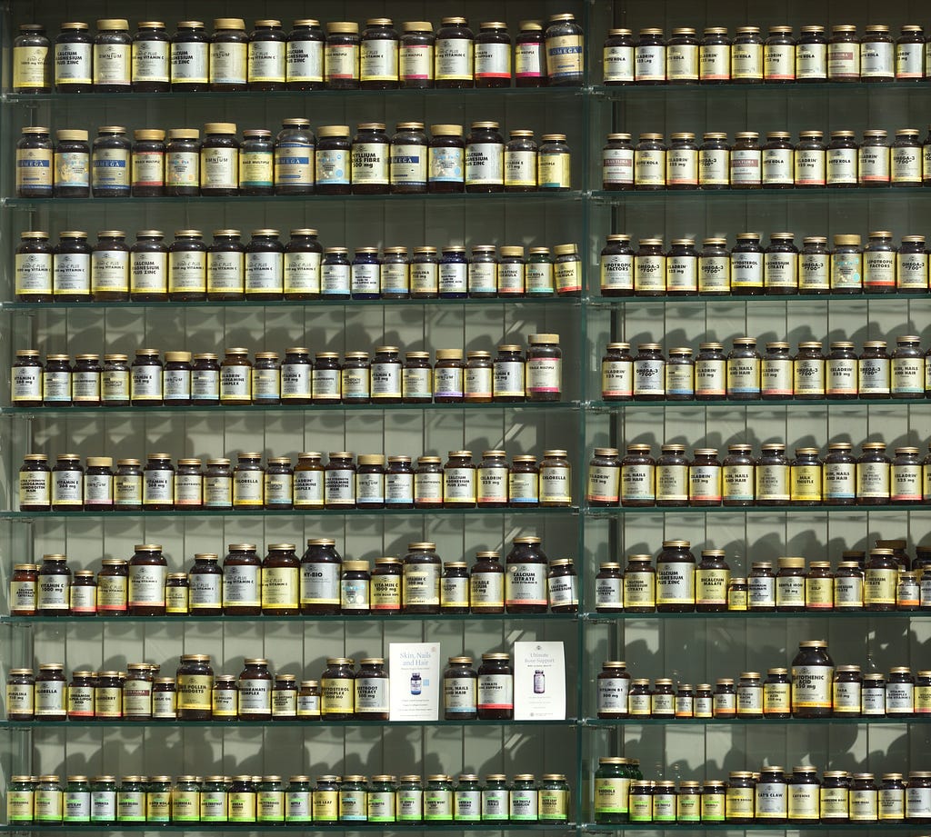 Shelf full of vitamin bottles