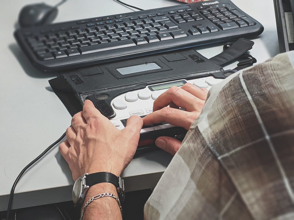Man using Assistive Technology on Computer