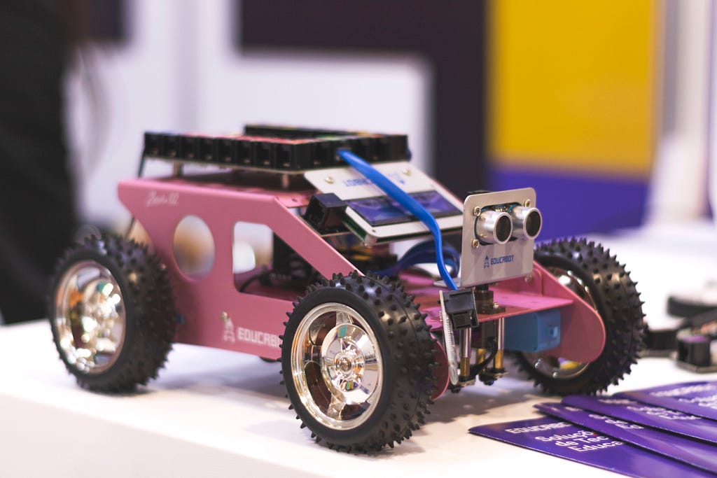 A tech-looking toy car with electronic equipment