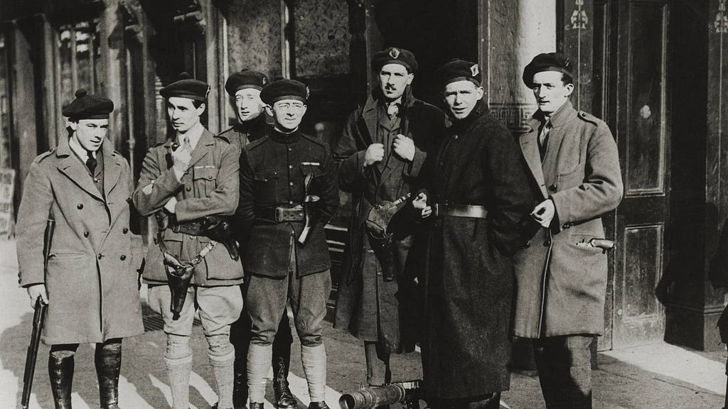 A black and white photo of paramilitary figures in 1920s Ireland