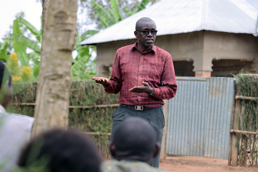 William Musoni during one of his workshops encouraging members of his community to adopt improved WASH practices including handwashing