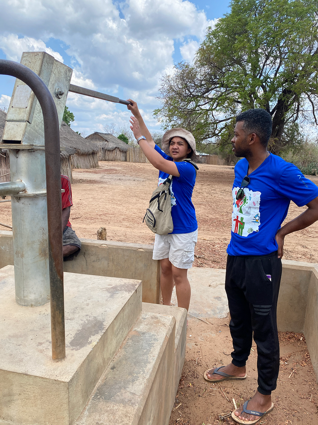 Seeing the impact in person of a new water pump supported through Variant Bio’s benefit-sharing program.