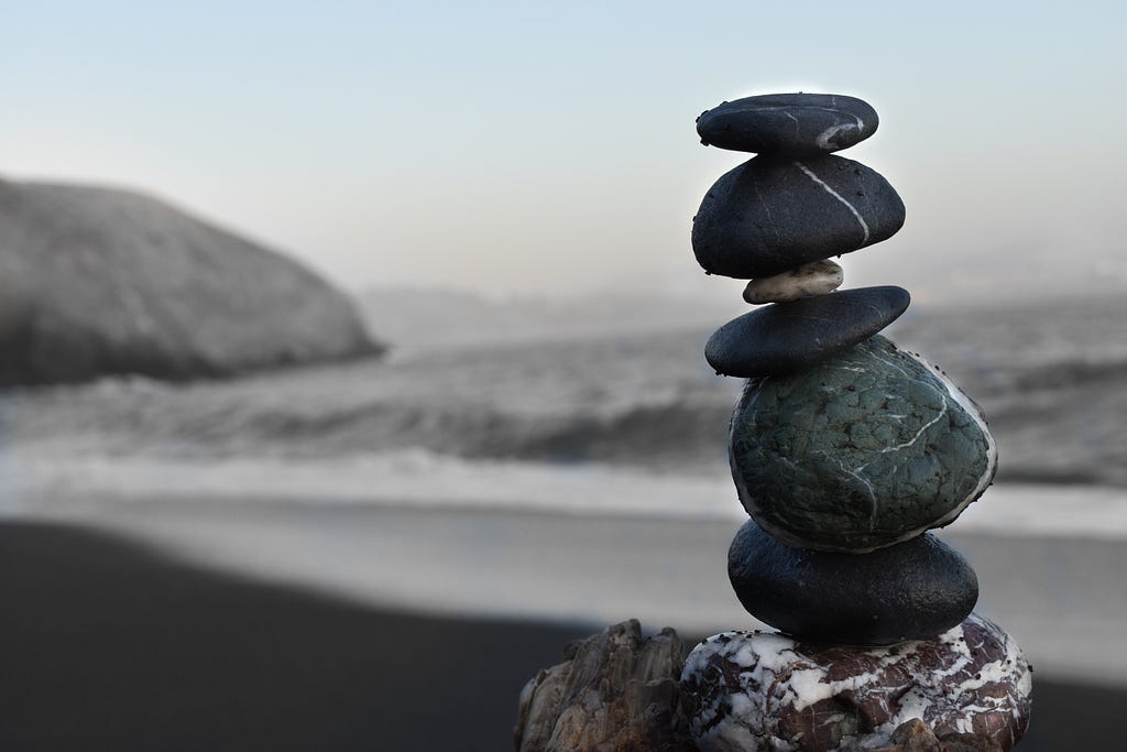 Hero image with stones on a beach