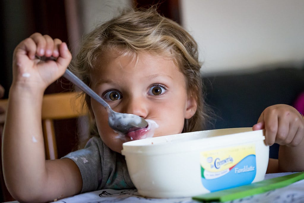 A child eating her food