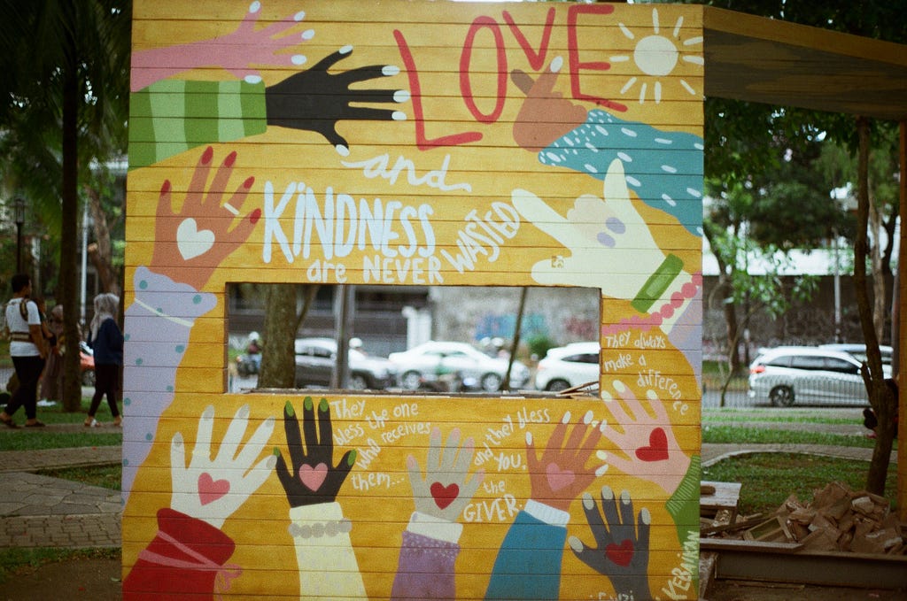 Love and kindness are never wasted on a decorative sign