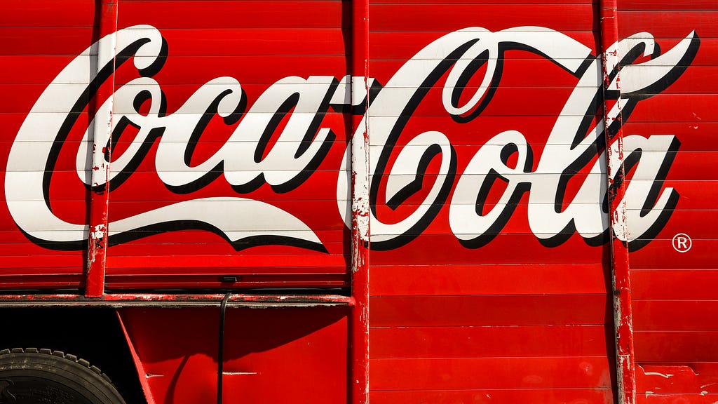 Old coca cola trailer with traditional branding