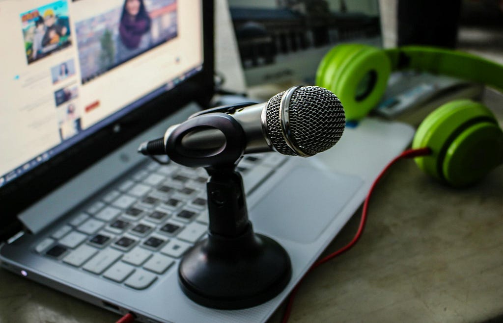 external microphone on laptop — one of the common computer peripherals for podcasters