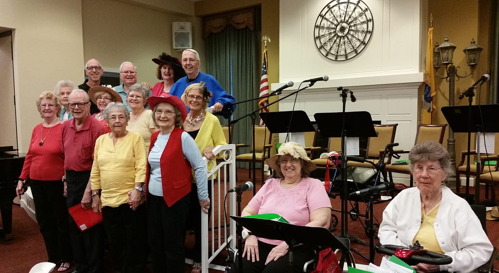 All 13 “cast members” of The Evergreens Acting Studio – Front Row (left to right): Residents Valerie Schwing, Paul Levesque, Louise Phillips, Barbara Farrell, Virginia Passanante, Marie Modic (far right, white jacket); Second Row (left to right): Residents Winnie Holden, Jan Scheckter, Marjorie Minarcik and Alice Gooch (yellow jacket); Third Row (left to right): Robb Hutter, Artistic Director, Philly Senior Stage; Residents Steve Smith, Patricia Rogers and Bill Mulqueen.