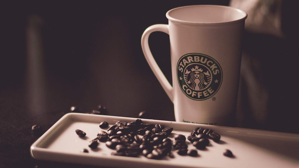 Starbucks Cup with Coffee Beans