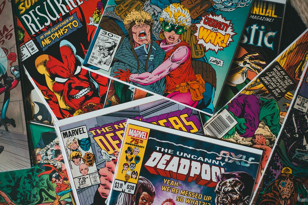 A scattered assortment of comic books.