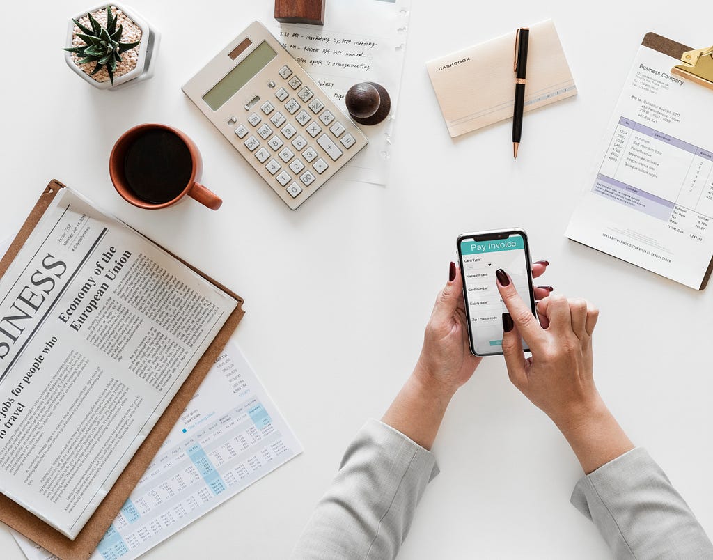 Business and communication tools on a table.